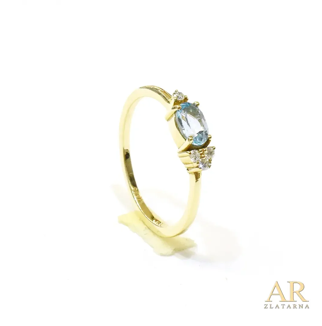 Zlatni prsten s dijamantima i  topazom
