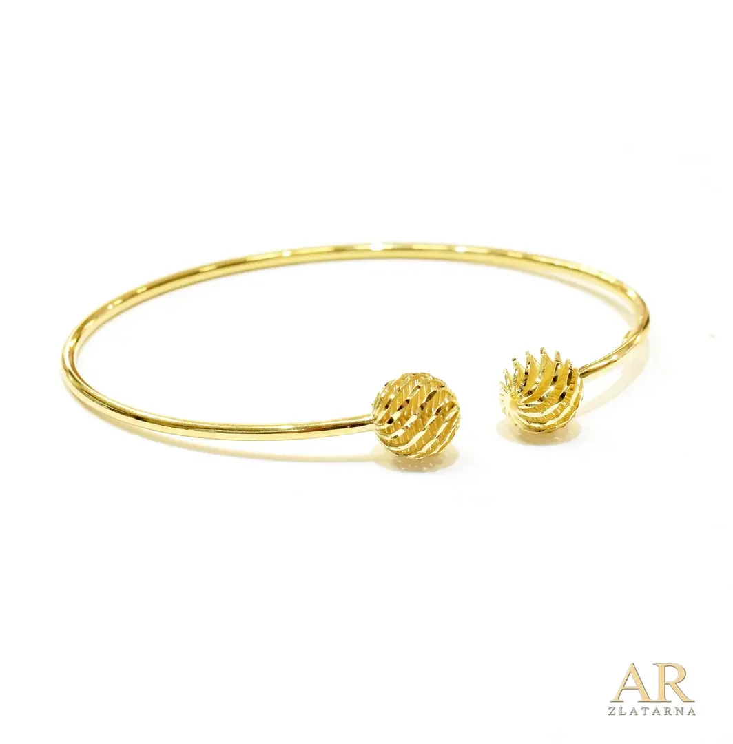 Zlatna narukvica kruta  izrađene kuglice