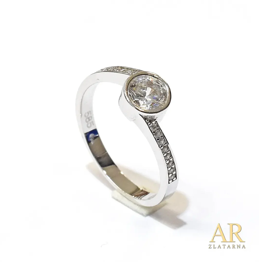 Zlatni zaručnički prsten  bijelo zlato uvijeni sa cirkonima po obodu i u kruni