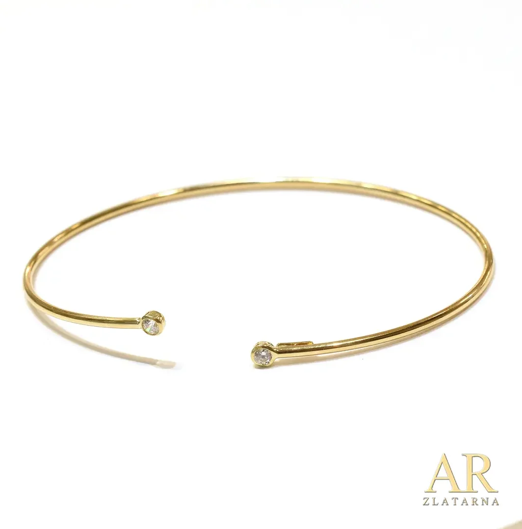 Zlatna narukvica kruta s dva cirkona
