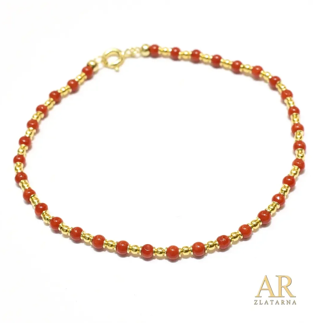 Srebrna koraljna narukvica sa pozlaćenim elementima