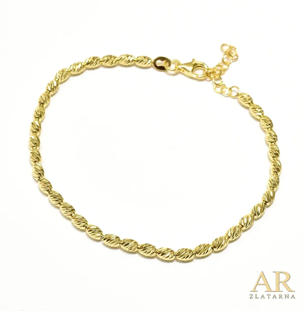 Srebrna pozlaćena narukvica ovalne dijamantirane kuglice